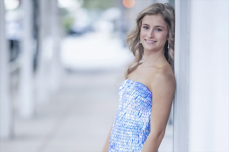 Senior portrait outdoors at golden hour